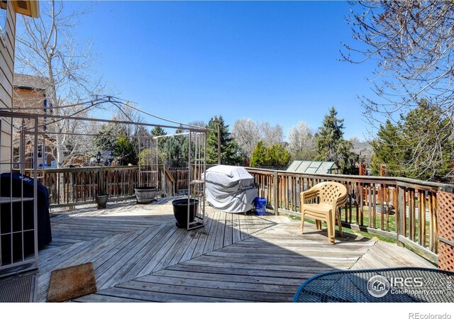5241 E 128th Way, Thornton, CO 80241 - wooden deck with area for grilling