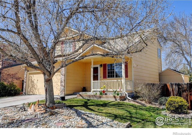 5241 E 128th Way, Thornton, CO 80241 - view of front of house with a porch and concrete driveway