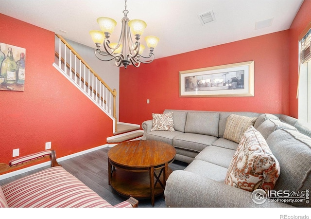 18656 Kelly Pl, Denver, CO 80249 - living area featuring wood finished floors, stairway, a chandelier, and baseboards