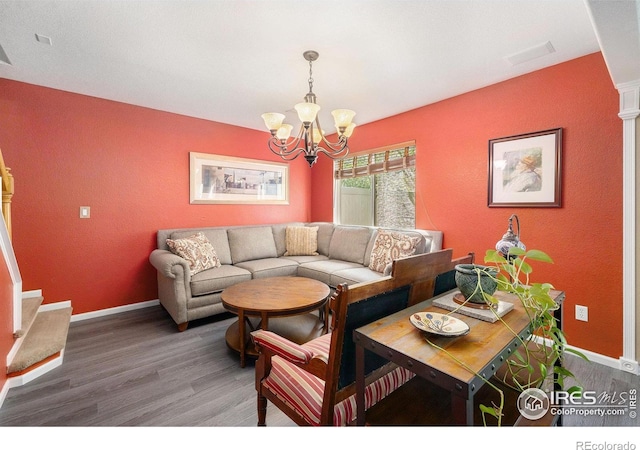 18656 Kelly Pl, Denver, CO 80249 - living area with wood finished floors, a chandelier, and baseboards