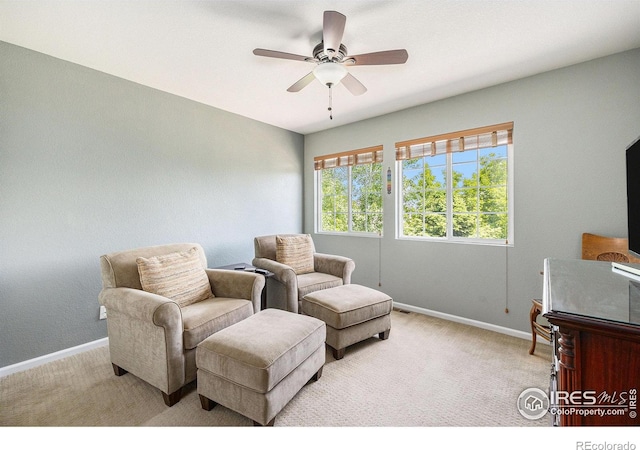 18656 Kelly Pl, Denver, CO 80249 - living area featuring carpet floors, baseboards, and ceiling fan