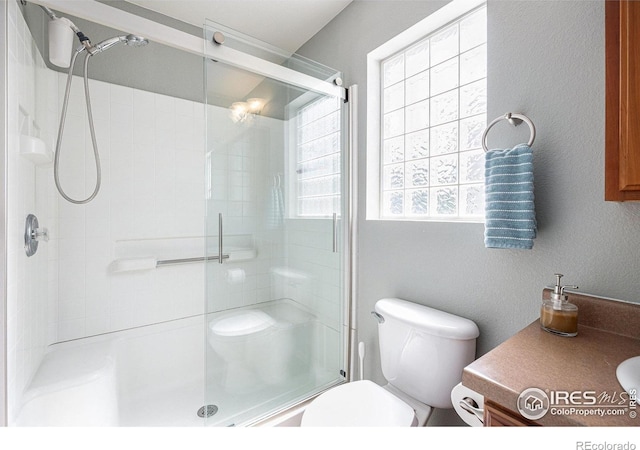 18656 Kelly Pl, Denver, CO 80249 - bathroom with toilet, plenty of natural light, and a shower stall