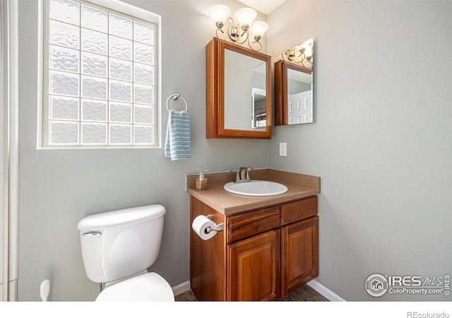 18656 Kelly Pl, Denver, CO 80249 - bathroom featuring vanity and toilet