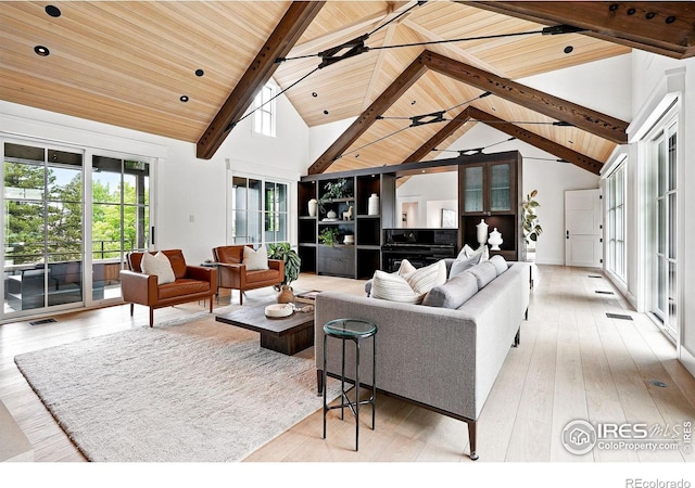 2100 Kohler Dr, Boulder, CO 80305 - living area featuring wooden ceiling with exposed beams, light wood finished floors, and high vaulted ceiling