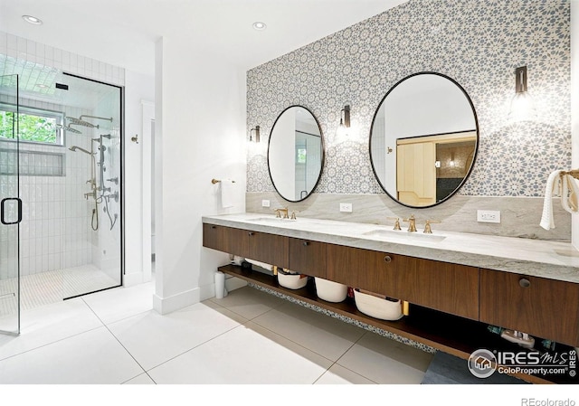 2100 Kohler Dr, Boulder, CO 80305 - bathroom with double vanity, a stall shower, baseboards, tile patterned flooring, and wallpapered walls