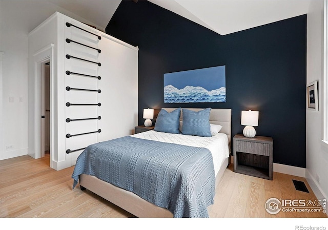 2100 Kohler Dr, Boulder, CO 80305 - bedroom featuring wood finished floors and baseboards