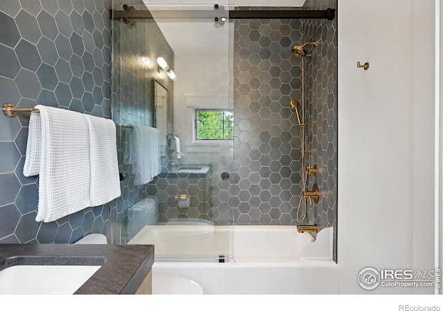 2100 Kohler Dr, Boulder, CO 80305 - bathroom featuring tile walls, vanity, shower / tub combination, and toilet