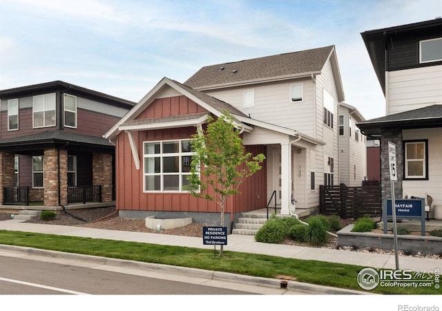 730 Promenade Dr, Superior, CO 80027 - view of front of house with board and batten siding and a porch