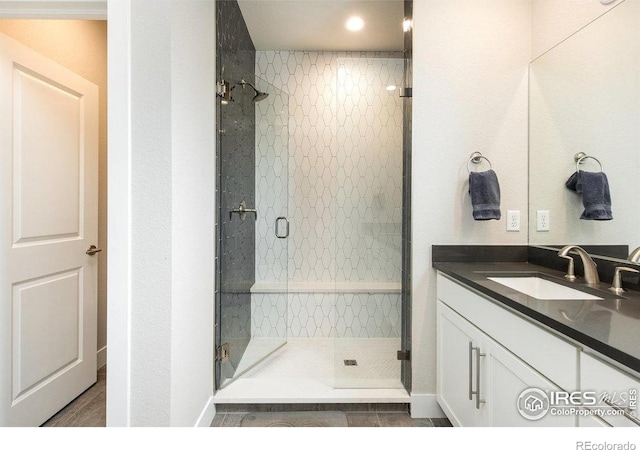 730 Promenade Dr, Superior, CO 80027 - bathroom featuring vanity, a shower stall, and recessed lighting