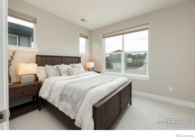 730 Promenade Dr, Superior, CO 80027 - bedroom featuring light colored carpet and baseboards