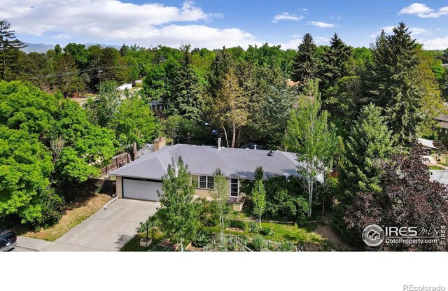 1307 Redwood Dr, Loveland, CO 80538 - view from above of property featuring a forest