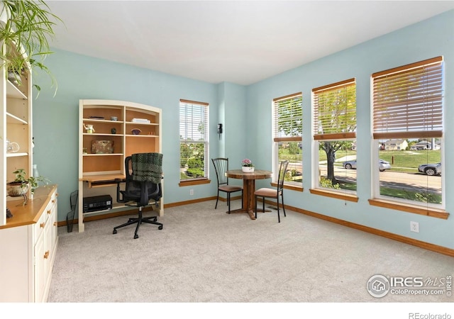 633 Deerwood Dr, Longmont, CO 80504 - home office with light carpet and baseboards
