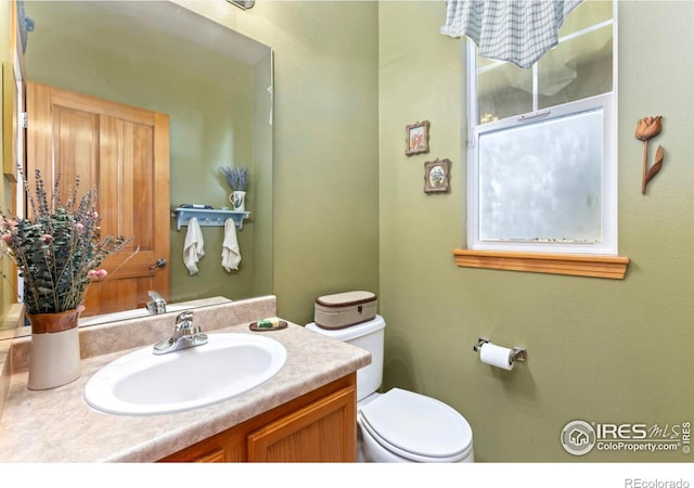 633 Deerwood Dr, Longmont, CO 80504 - bathroom with toilet and vanity