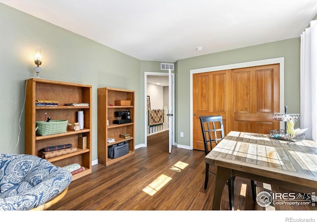 633 Deerwood Dr, Longmont, CO 80504 - dining area with dark wood-style flooring and baseboards