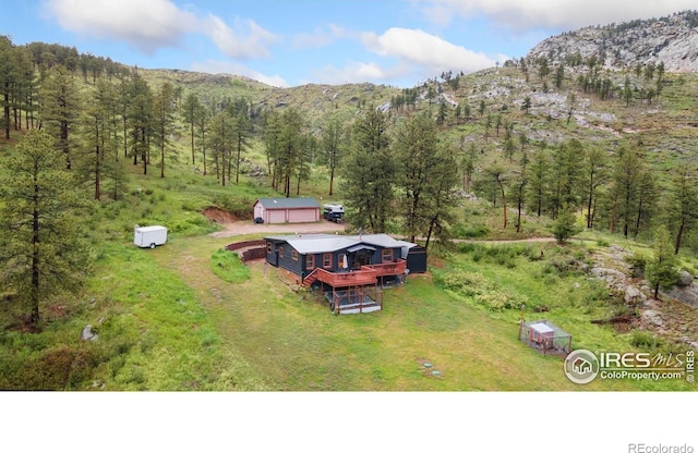146 Wild Turkey Pl, Drake, CO 80515 - view from above of property with mountains and a heavily wooded area
