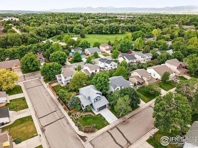 823 Timothy Dr, Longmont, CO 80503 - aerial view of residential area with a mountain backdrop