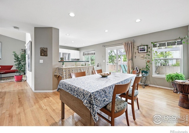 823 Timothy Dr, Longmont, CO 80503 - dining area featuring baseboards, light wood-style flooring, and recessed lighting