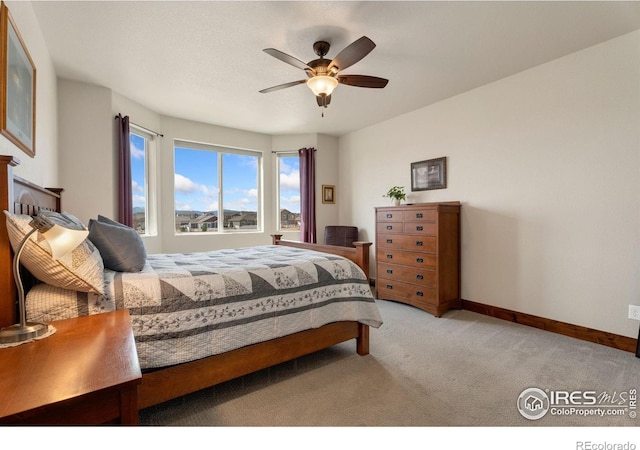 5532 Maidenhead Dr, Windsor, CO 80550 - bedroom featuring carpet flooring, a ceiling fan, and baseboards