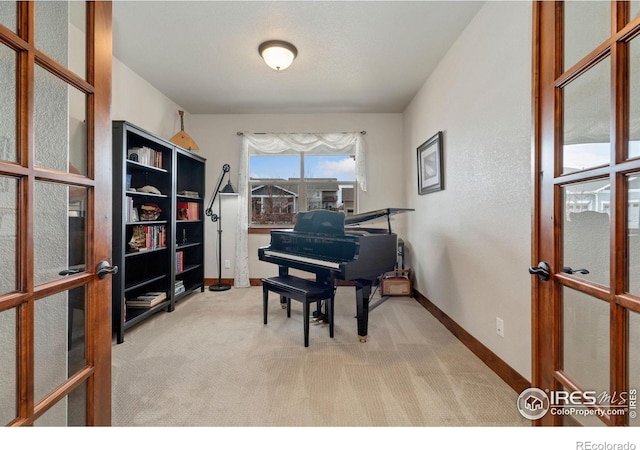 5532 Maidenhead Dr, Windsor, CO 80550 - sitting room with french doors, carpet, and baseboards