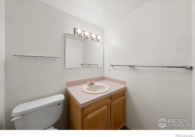 2615 Anemonie Dr, Loveland, CO 80537 - half bathroom with toilet and vanity