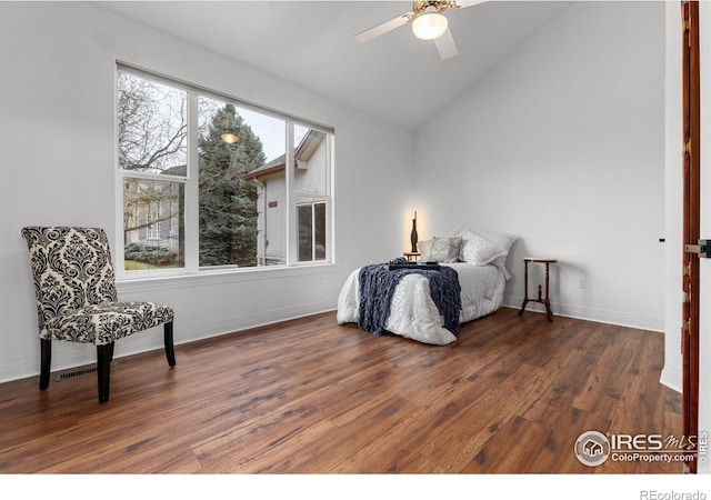 2549 Cowley Dr, Lafayette, CO 80026 - bedroom with wood finished floors, vaulted ceiling, baseboards, and a ceiling fan