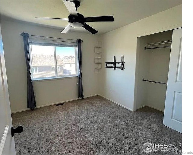 1801 102nd Ave, Greeley, CO 80634 - unfurnished bedroom with a closet, carpet floors, and a ceiling fan