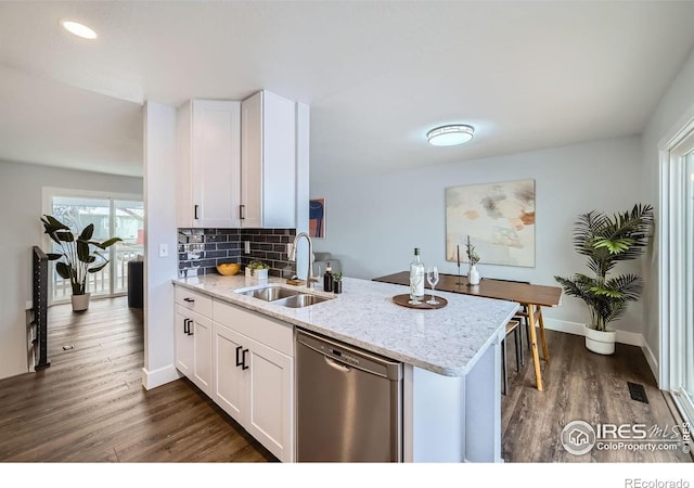 1714 Zeus Dr, Lafayette, CO 80026 - kitchen with dishwasher, a sink, dark wood-type flooring, light stone countertops, and white cabinetry