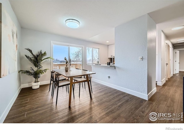 1714 Zeus Dr, Lafayette, CO 80026 - dining room featuring dark wood-style flooring and baseboards