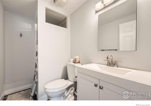 1714 Zeus Dr, Lafayette, CO 80026 - full bath with toilet, vanity, and curtained shower