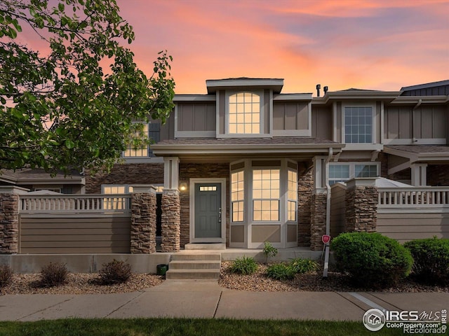 4795 Raven Run, Broomfield, CO 80023 - view of front of house with stone siding and stucco siding