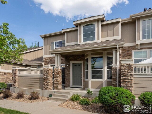 4795 Raven Run, Broomfield, CO 80023 - view of front of property featuring stone siding and board and batten siding