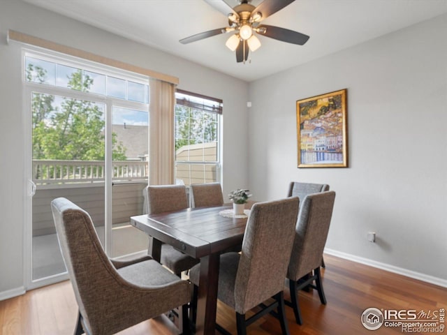 4795 Raven Run, Broomfield, CO 80023 - dining area featuring baseboards, wood finished floors, and ceiling fan