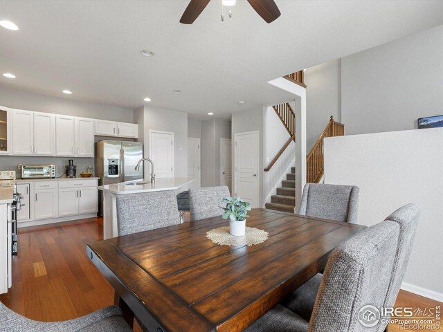 4795 Raven Run, Broomfield, CO 80023 - dining room with stairway, dark wood-style flooring, ceiling fan, and recessed lighting