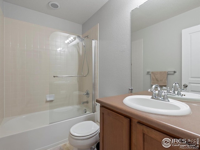 4795 Raven Run, Broomfield, CO 80023 - full bath featuring vanity, toilet, bathing tub / shower combination, and a textured wall
