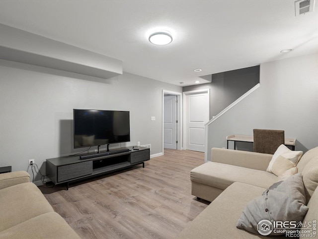 4795 Raven Run, Broomfield, CO 80023 - living area featuring wood finished floors, baseboards, and recessed lighting
