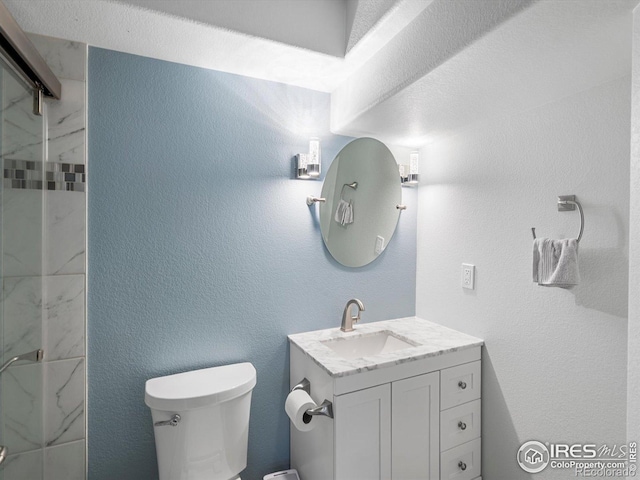 4795 Raven Run, Broomfield, CO 80023 - bathroom featuring toilet, vanity, and a shower
