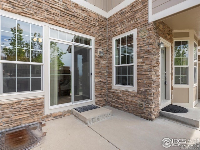 4795 Raven Run, Broomfield, CO 80023 - doorway to property with stone siding