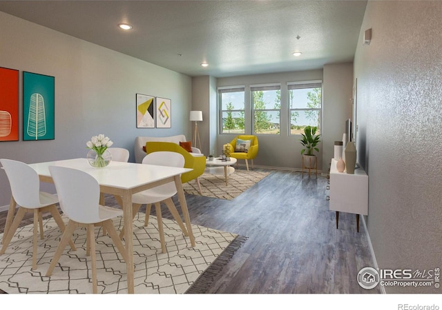 1811 Bounty Dr Unit 4, Windsor, CO 80550 - dining room featuring wood finished floors, recessed lighting, a textured wall, and baseboards