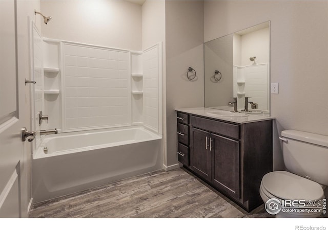 1811 Bounty Dr Unit 4, Windsor, CO 80550 - full bath with vanity, wood finished floors, toilet, and shower / washtub combination