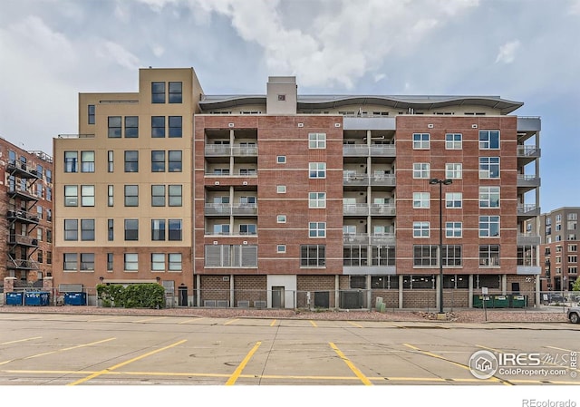 2245 Blake St Unit D, Denver, CO 80205 - view of apartment building / complex with uncovered parking