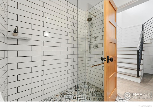 2970 21st St, Boulder, CO 80304 - bathroom featuring a stall shower and wood finished floors