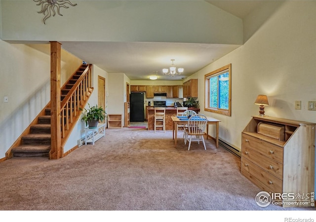 38 Navajo Trl, Nederland, CO 80466 - dining space featuring a baseboard radiator, light colored carpet, and stairs