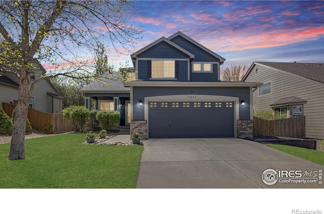 5822 Shenandoah Ave, Firestone, CO 80504 - craftsman inspired home featuring driveway, an attached garage, and brick siding