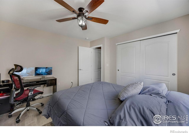 5822 Shenandoah Ave, Firestone, CO 80504 - bedroom featuring wood finished floors, a closet, an office area, and ceiling fan