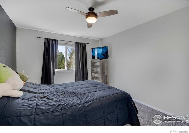 5822 Shenandoah Ave, Firestone, CO 80504 - carpeted bedroom featuring baseboards and a ceiling fan