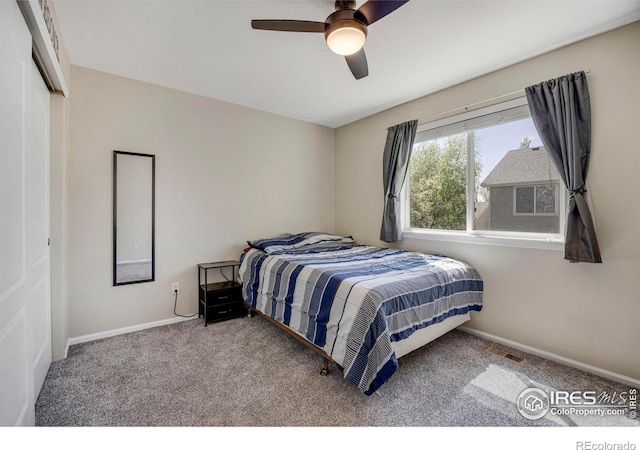 5822 Shenandoah Ave, Firestone, CO 80504 - bedroom with carpet flooring, baseboards, and ceiling fan