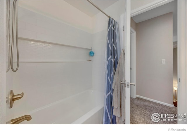 5822 Shenandoah Ave, Firestone, CO 80504 - full bath with shower / bath combo and baseboards