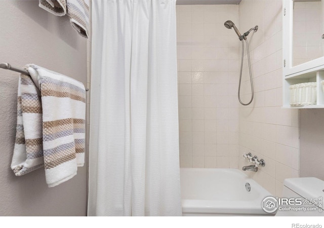 13441 Sheridan Blvd, Broomfield, CO 80020 - bathroom featuring shower / tub combo with curtain and toilet