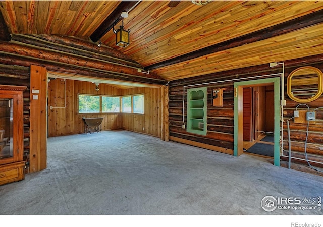 545 Eldorado Ave, Nederland, CO 80466 - spare room featuring carpet flooring, wood ceiling, and rustic walls