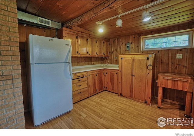 545 Eldorado Ave, Nederland, CO 80466 - kitchen featuring freestanding refrigerator, light wood-type flooring, track lighting, light countertops, and wooden ceiling